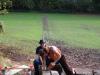 Me weighing down the plank while being cut