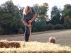 After four courses pins all the way down into the bottom bale.