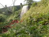 cooling breeze next to the waterfall