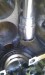 Knocking in new canshaft bearings with an appropriate sized socket.