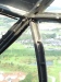 looking out through cockpit window.
